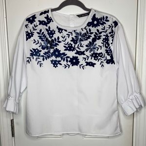 Zara white top with blue floral appliqué
